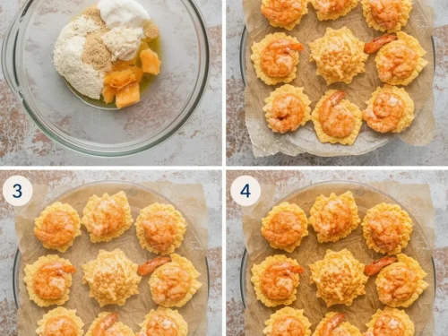 A platter of holiday shrimp puff pastry bites arranged for a festive gathering.