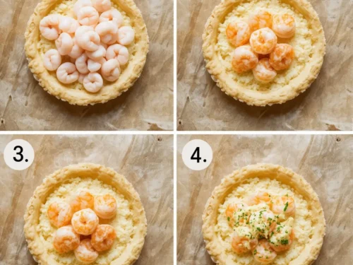 Assortment of golden mini shrimp and cheese tartlets neatly arranged for serving.