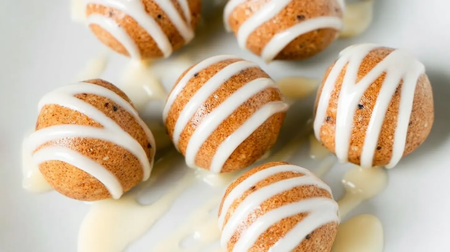 Small cinnamon roll protein bites drizzled with white icing