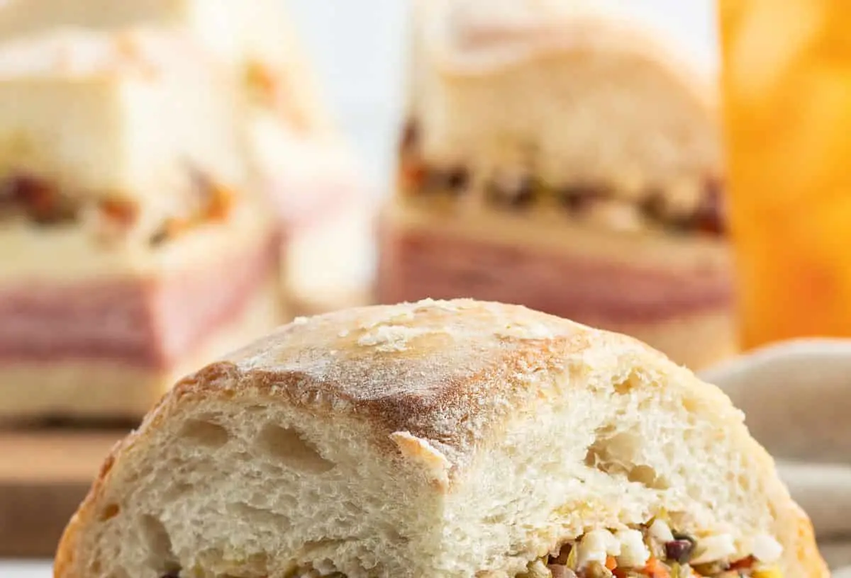 A New Orleans muffuletta sandwich with olive salad and various meats