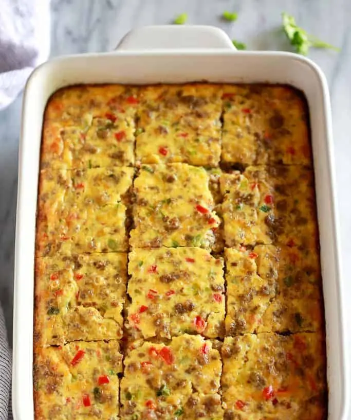 A hot and easy breakfast casserole, perfect for busy mornings, prepared in a baking dish.