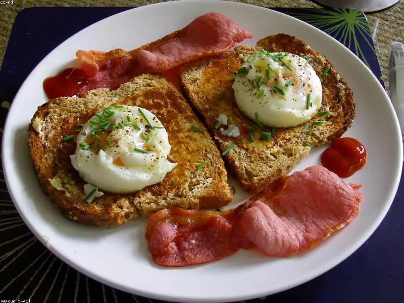 A collection of quick fast family breakfast recipes laid out on a kitchen counter.