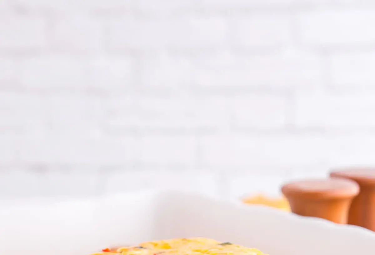 A healthy breakfast casserole arranged for meal prep in individual containers.