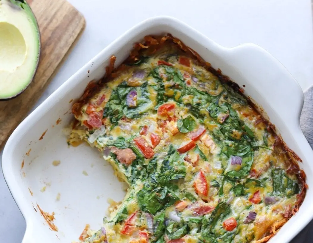 A healthy breakfast casserole loaded with colorful vegetables, ready to serve.