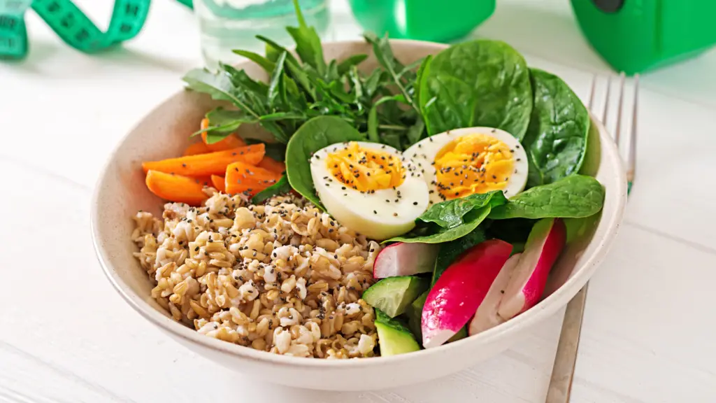 Various healthy breakfast ideas for every day displayed on a table.