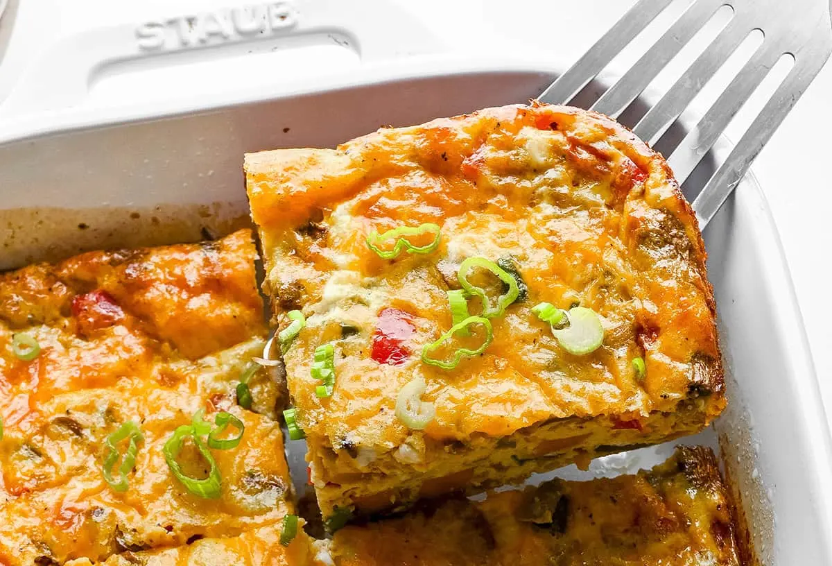 A freshly baked wholesome breakfast casserole, steaming hot and ready to serve.